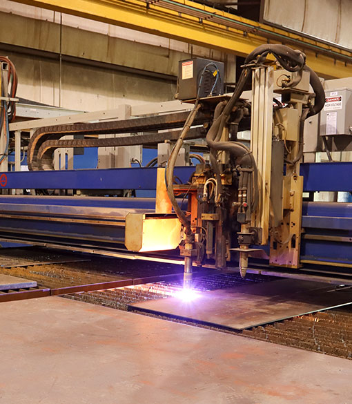 image of industrial fabrication machinery in action