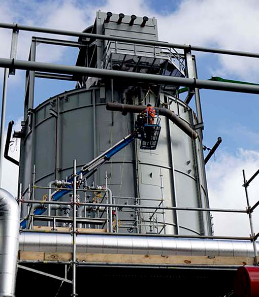 Image of industrial worker inspecting work