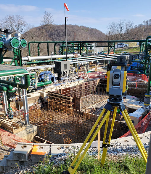 image of survey equipment on industrial job site