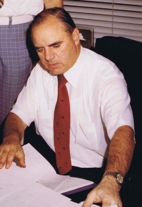 Image of Paul Songer working at his desk.
